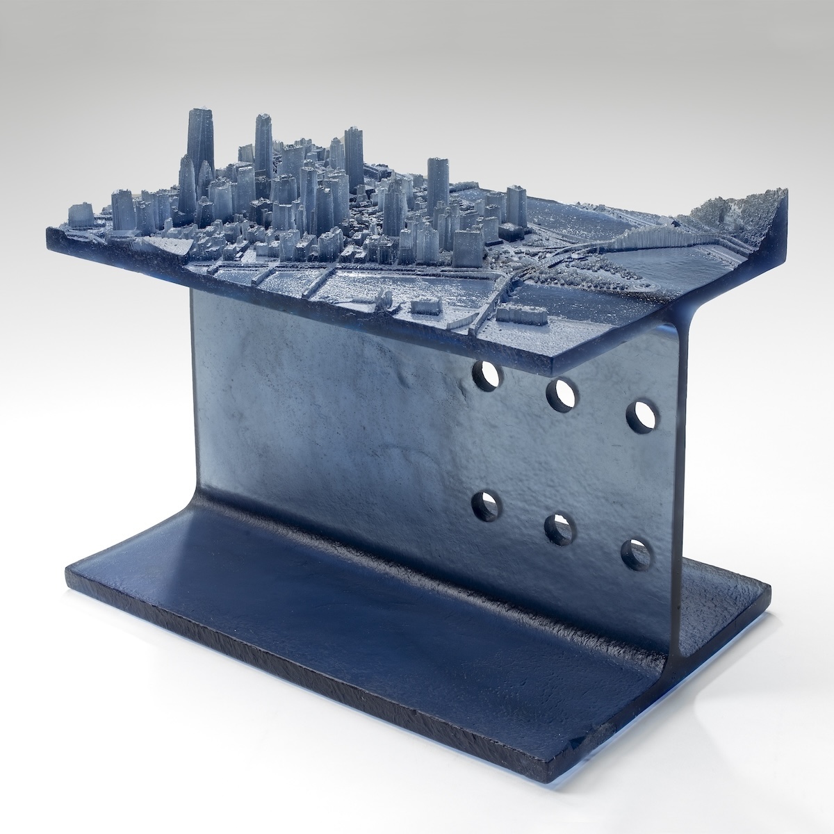 Glass sculptures of U.S. skylines highlight iconic cities and their industrial history