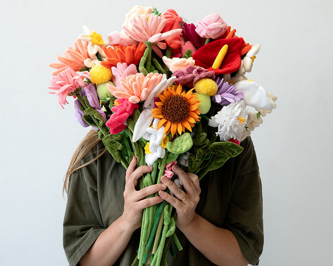 Cj hendry`s flower market opens in NYC, inviting visitors to pick a plush blossom