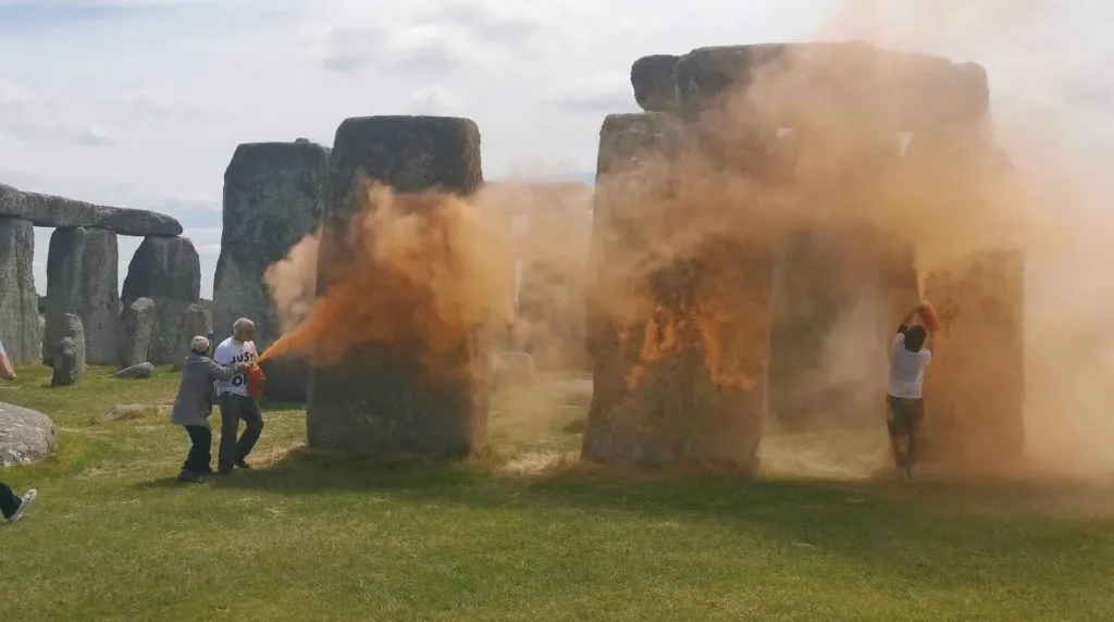 Climate Change Protesters Arrested After Spraying Stonehenge with Orange Paint
