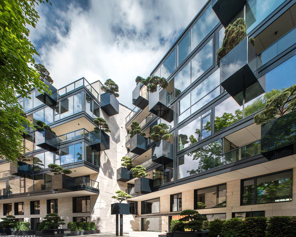 Planters Filled With Bonsai Trees Cover The Exterior Of This Building