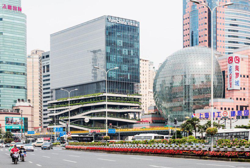 jacques ferrier + sensual city studio bring greenery to shanghais busiest intersection