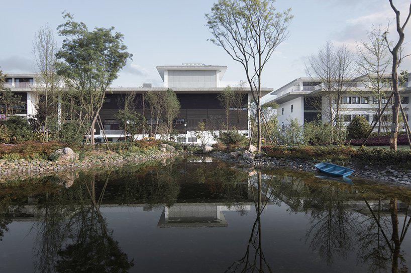 atelier FCJZ completes vast visitor center informed by sichuans low-key architecture