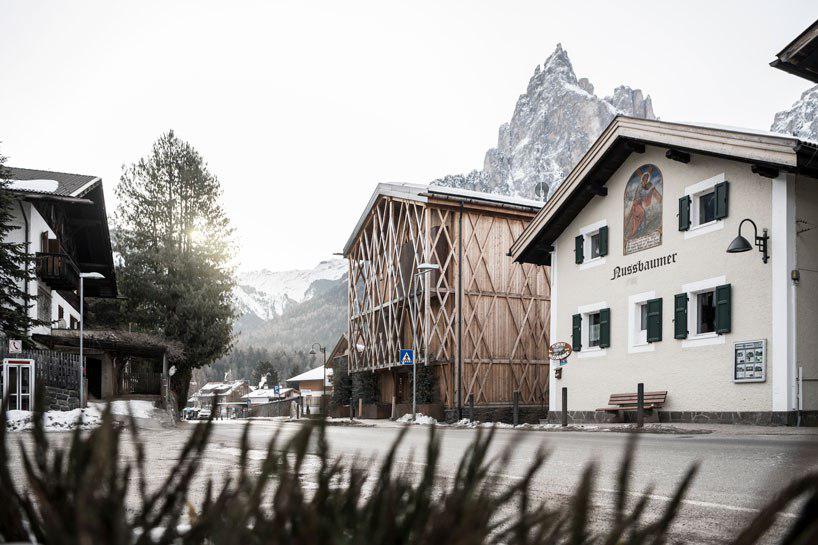 noa designs traditional alpine mountain home with unexpected interior spaces