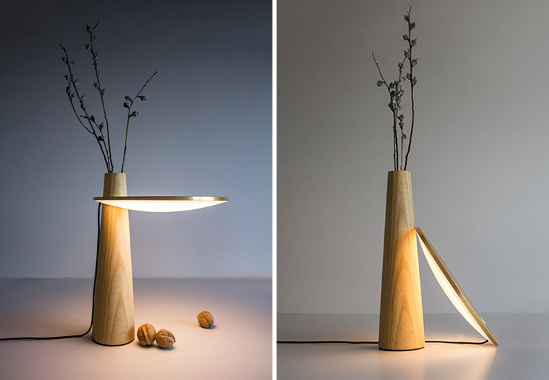ترکیبی از یک لامپ، میز و گلدان
